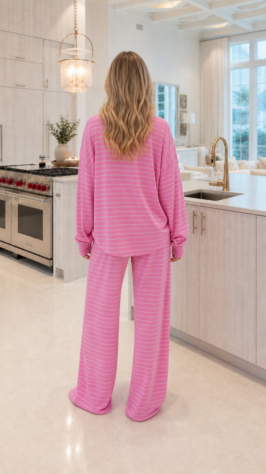 Back view of model wearing pink striped waffle knit lounge set
