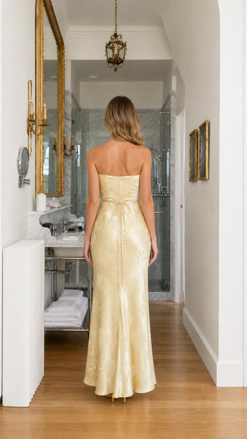 Back view showing tie detail on yellow maxi dress