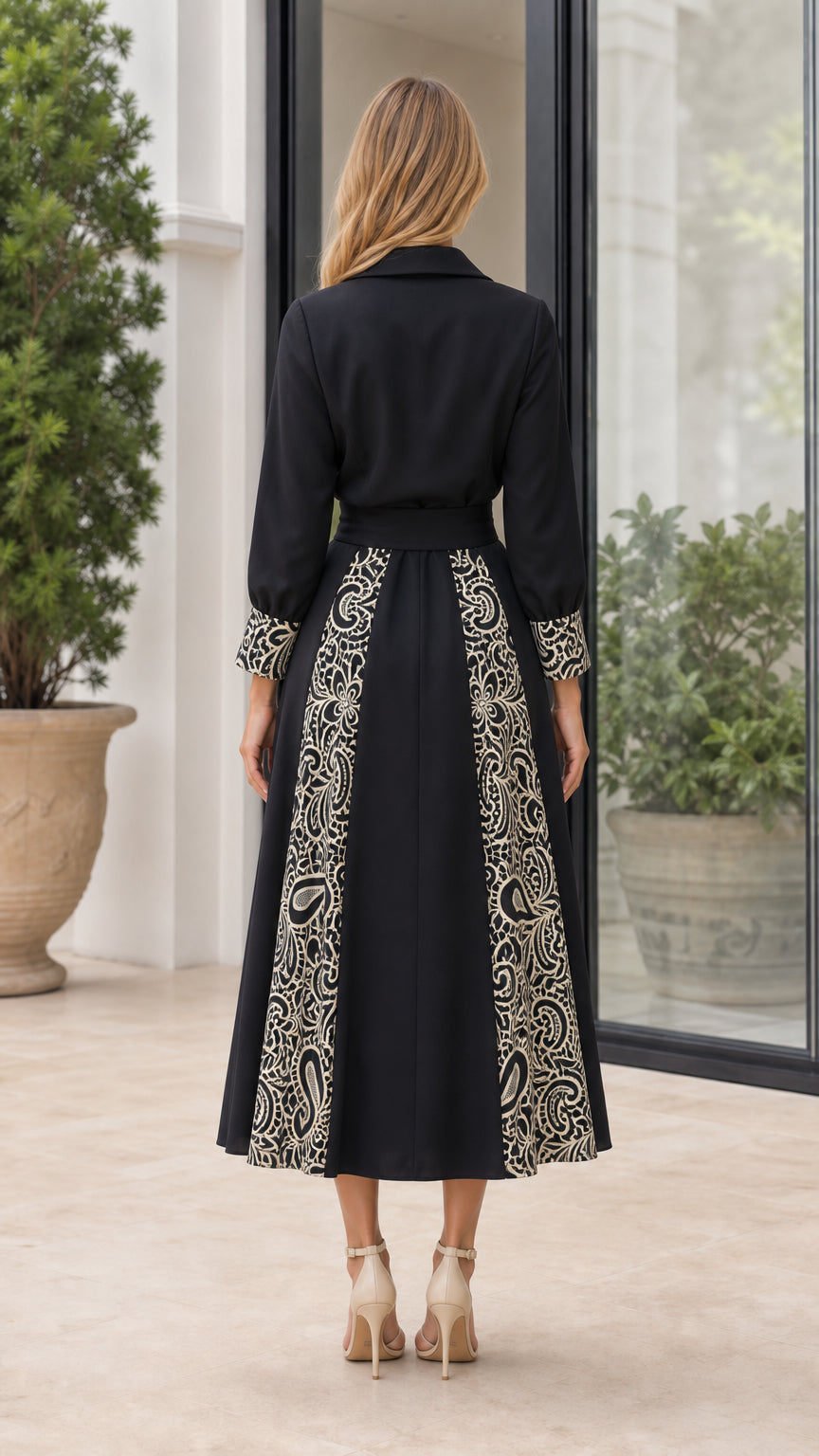 Back view of woman in Black embroidered midi shirt dress