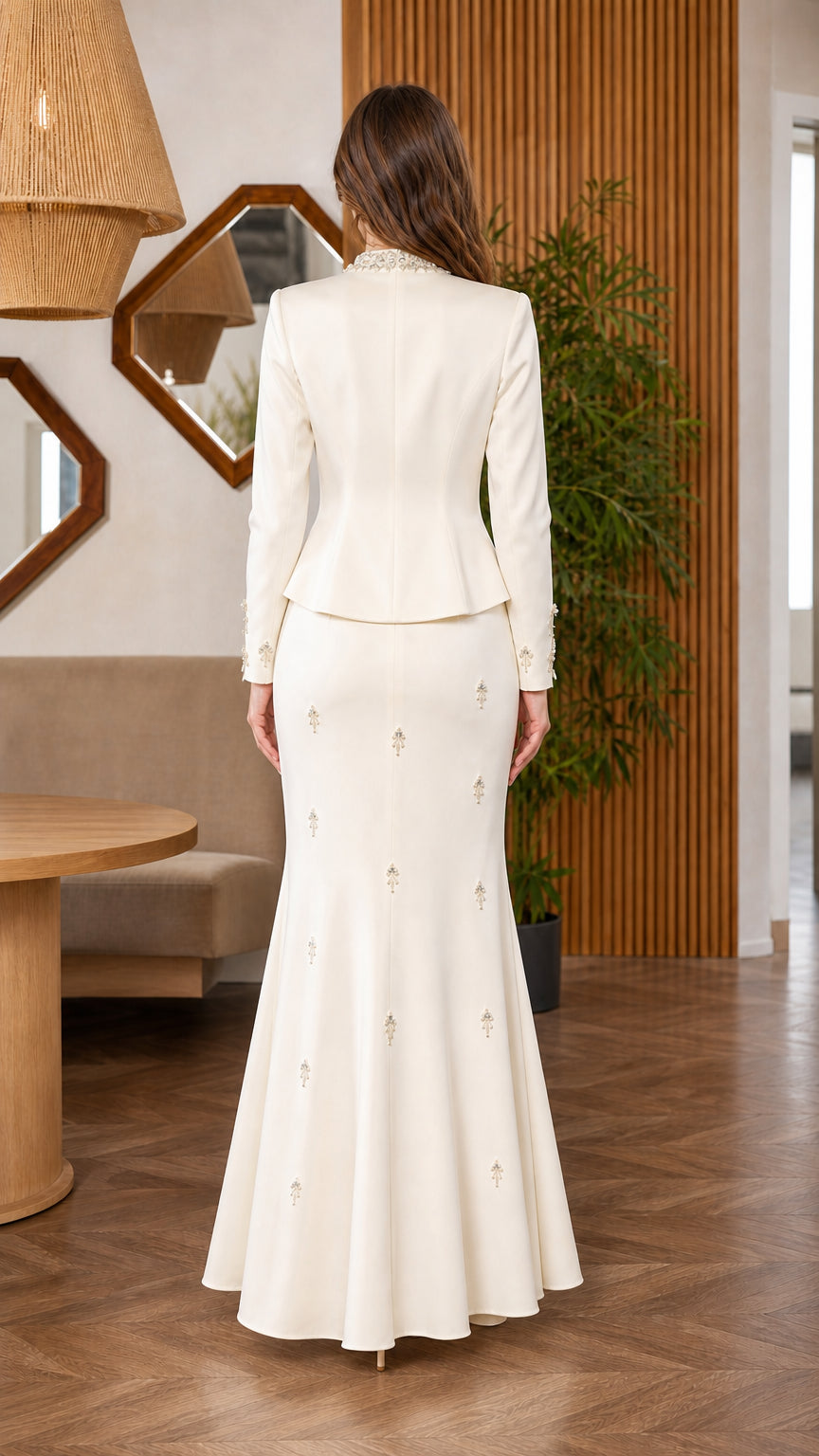 Back view of ivory long sleeve peplum evening dress set