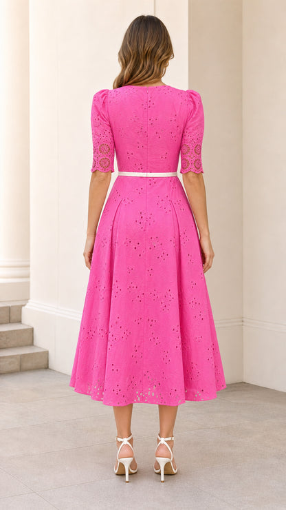 Back view of hot pink eyelet midi dress