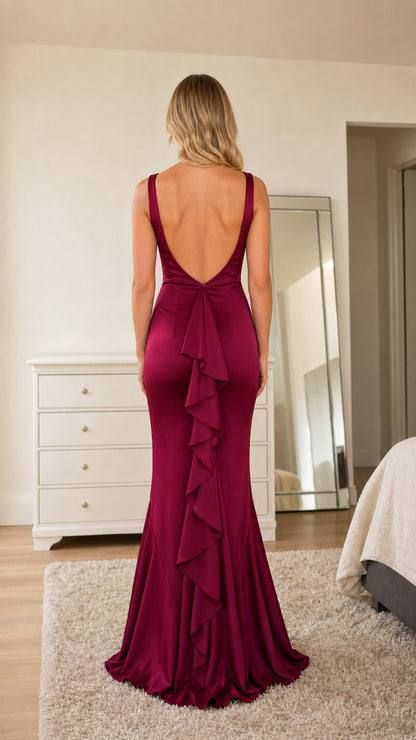 Back view showcasing open back and cascading ruffles