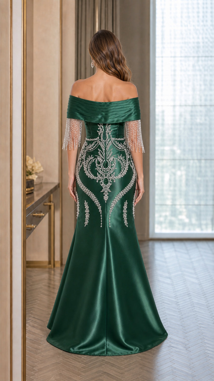 Back view of emerald green off-shoulder formal evening gown
