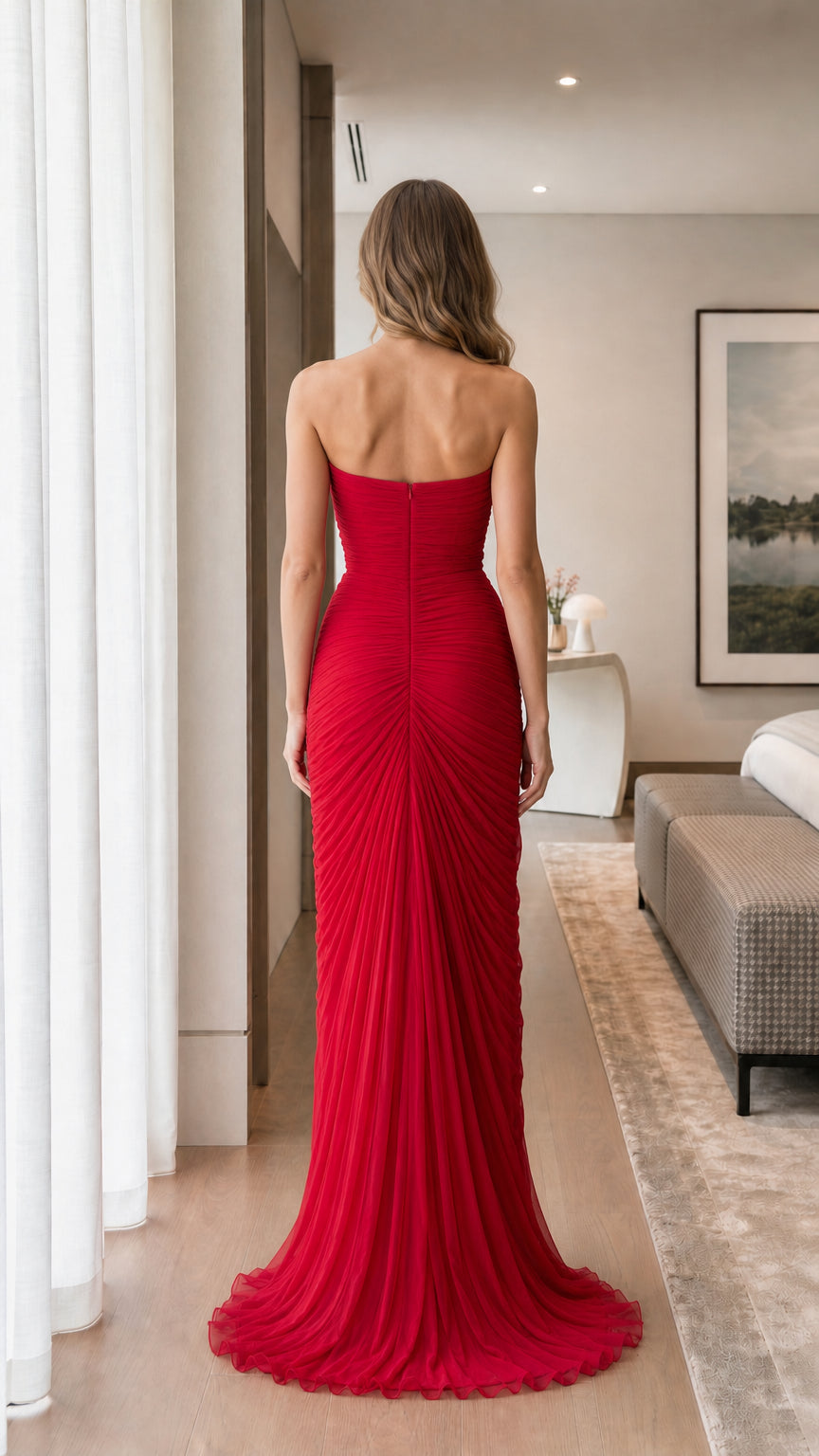 Back view of red strapless tulle evening gown