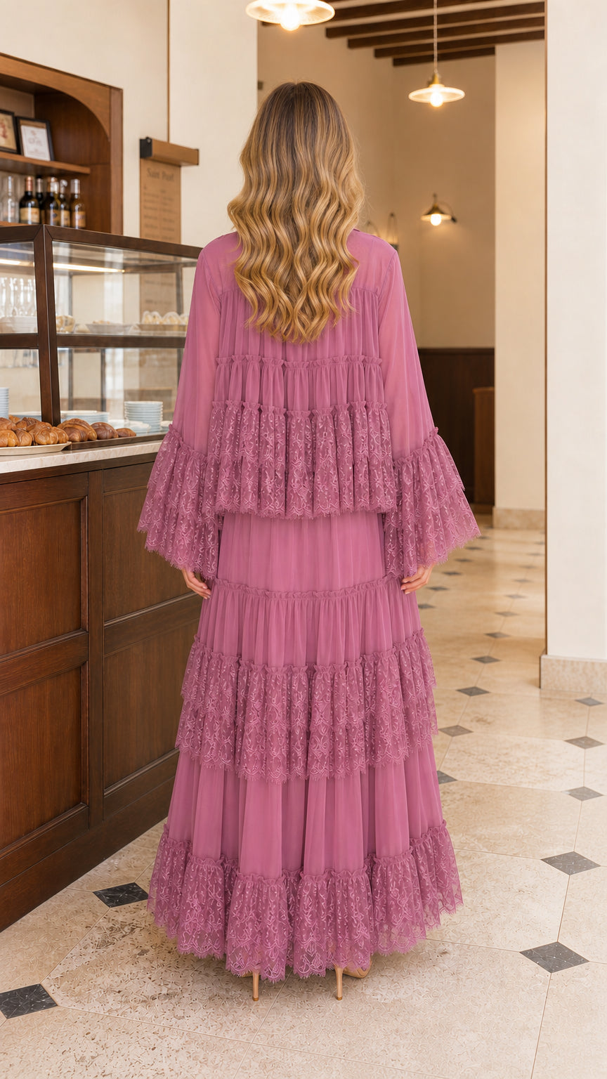 Back view of model wearing mauve tiered lace maxi dress