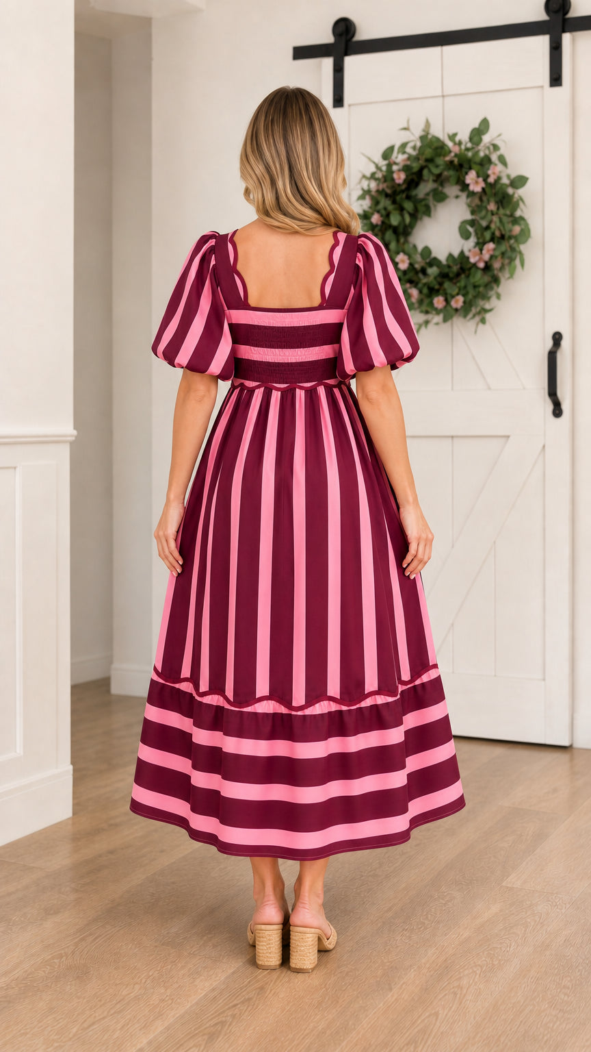 Back view of burgundy striped midi dress
