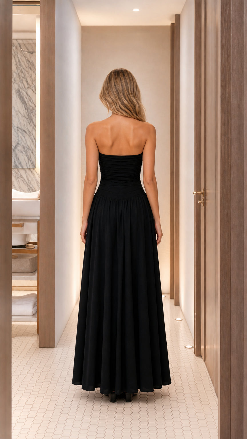 Back view of black strapless maxi dress