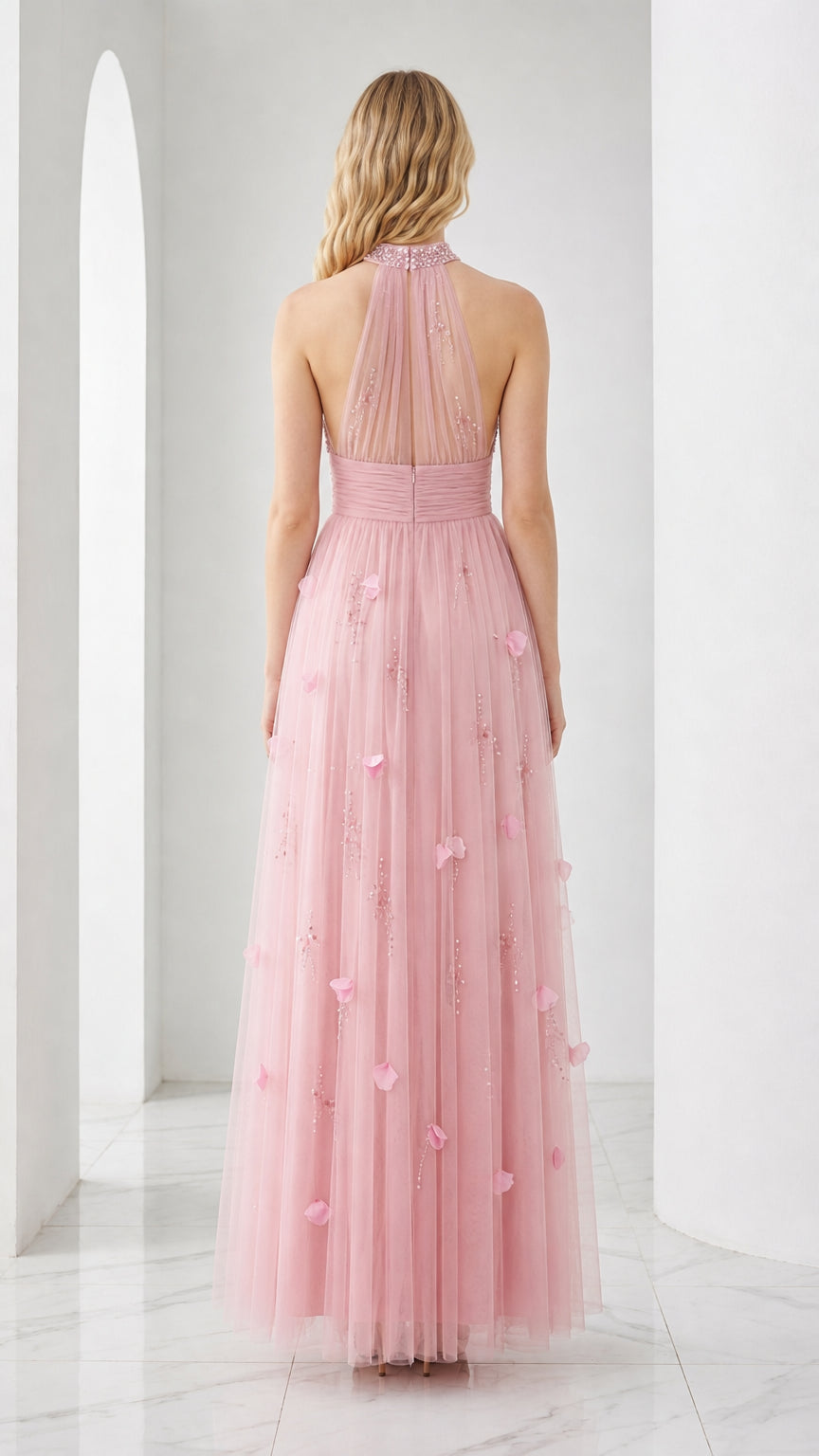 Pink formal gown back view showing sheer tulle detail