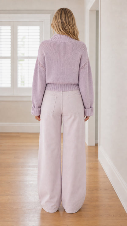 Back view of model wearing lavender half-zip pullover sweater