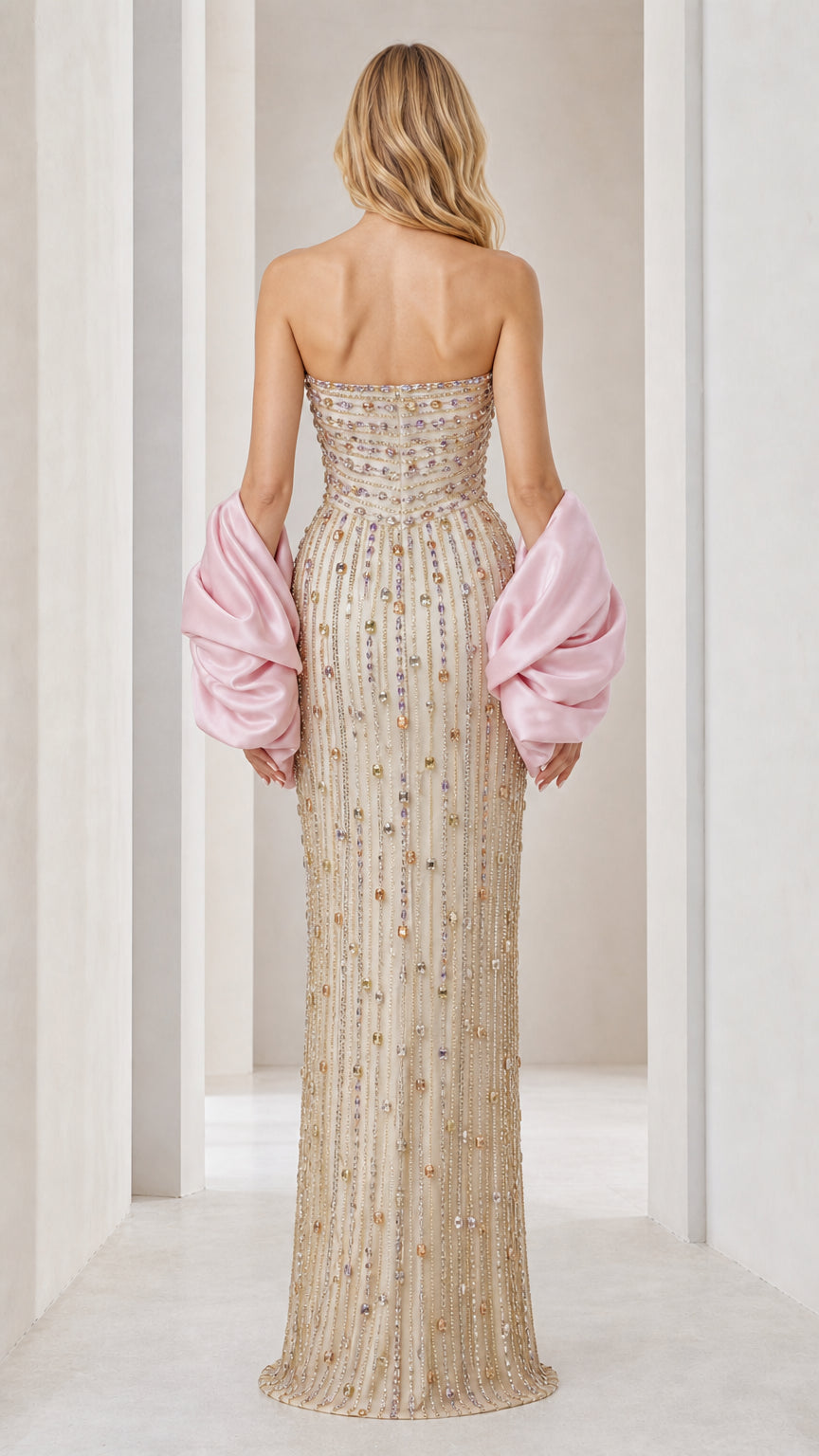 Back view of champagne beaded column gown