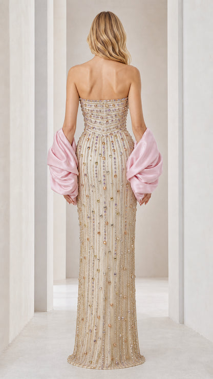Back view of champagne beaded column gown