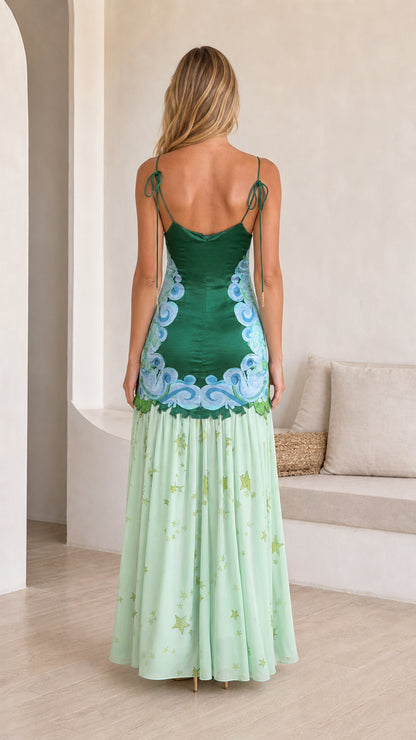 Back view showcasing tie straps on green dress