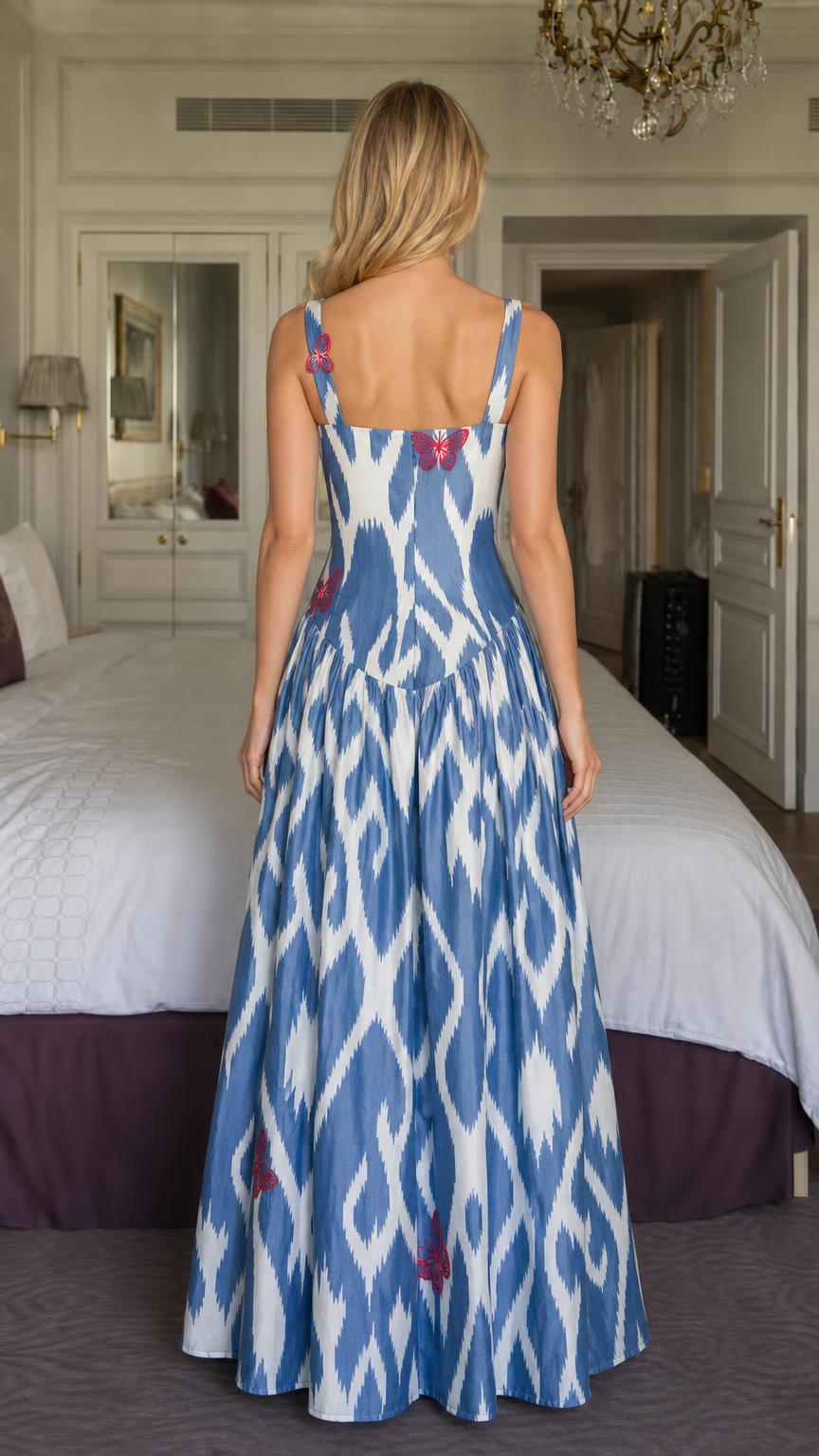 Back view of woman wearing blue ikat maxi dress