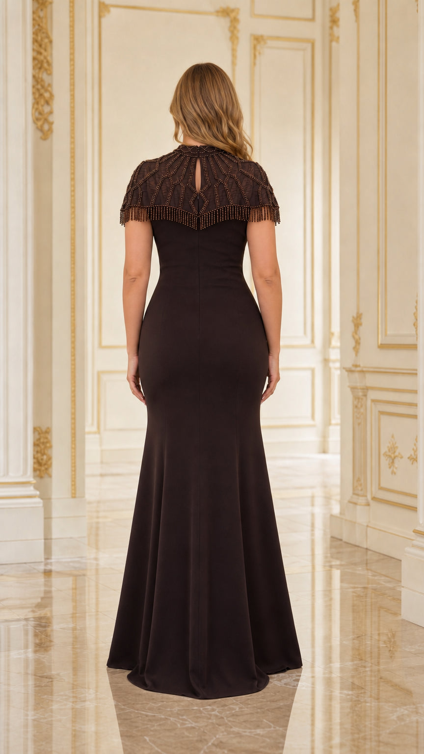 Back view of Chocolate Brown formal gown showcasing back keyhole and beaded overlay