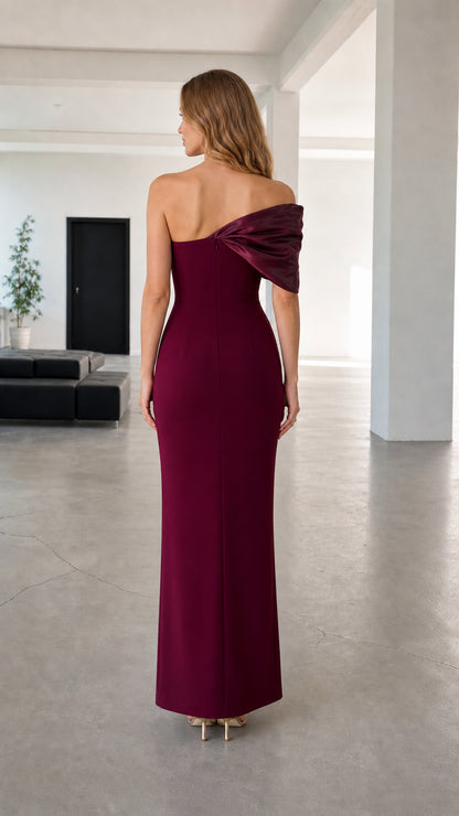 Back view of burgundy asymmetric draped back formal evening gown
