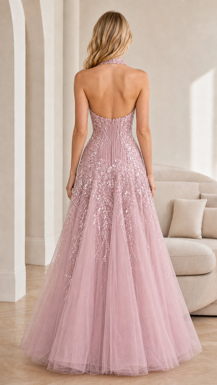 Back view showing open back design of pink gown