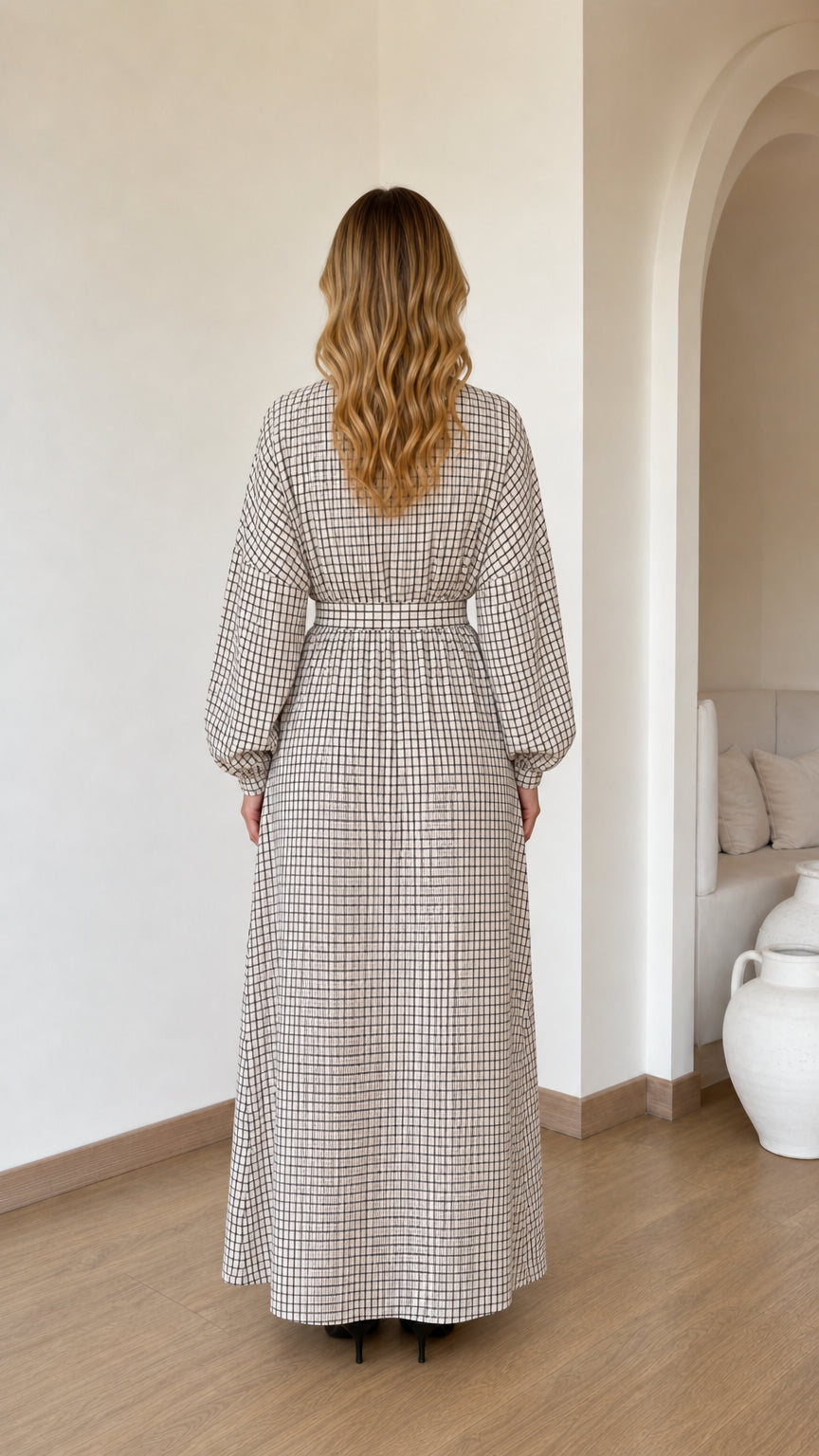 Back view of woman wearing Cream plaid full length maxi dress