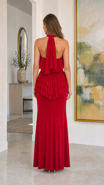 Back view of model showing the tie-back halter closure on Red Maxi Dress