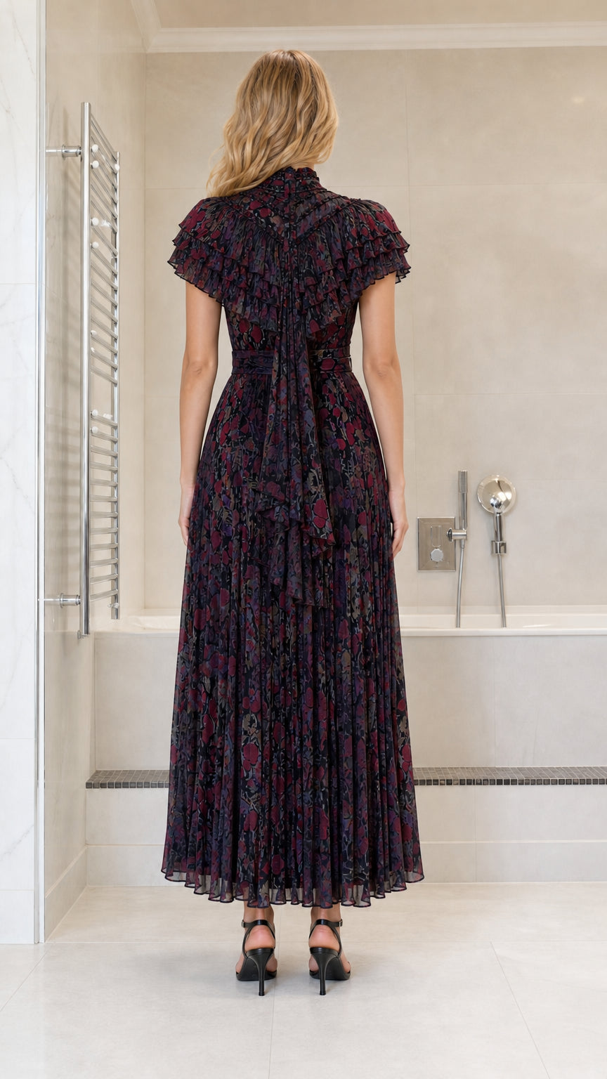 Back view showing pleated texture and back detail of maxi dress