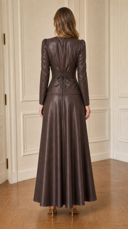 Back view of woman showcasing laced detail on brown faux leather dress