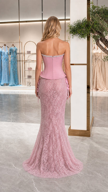 Back view of dusty pink strapless lace gown with contoured corset bodice