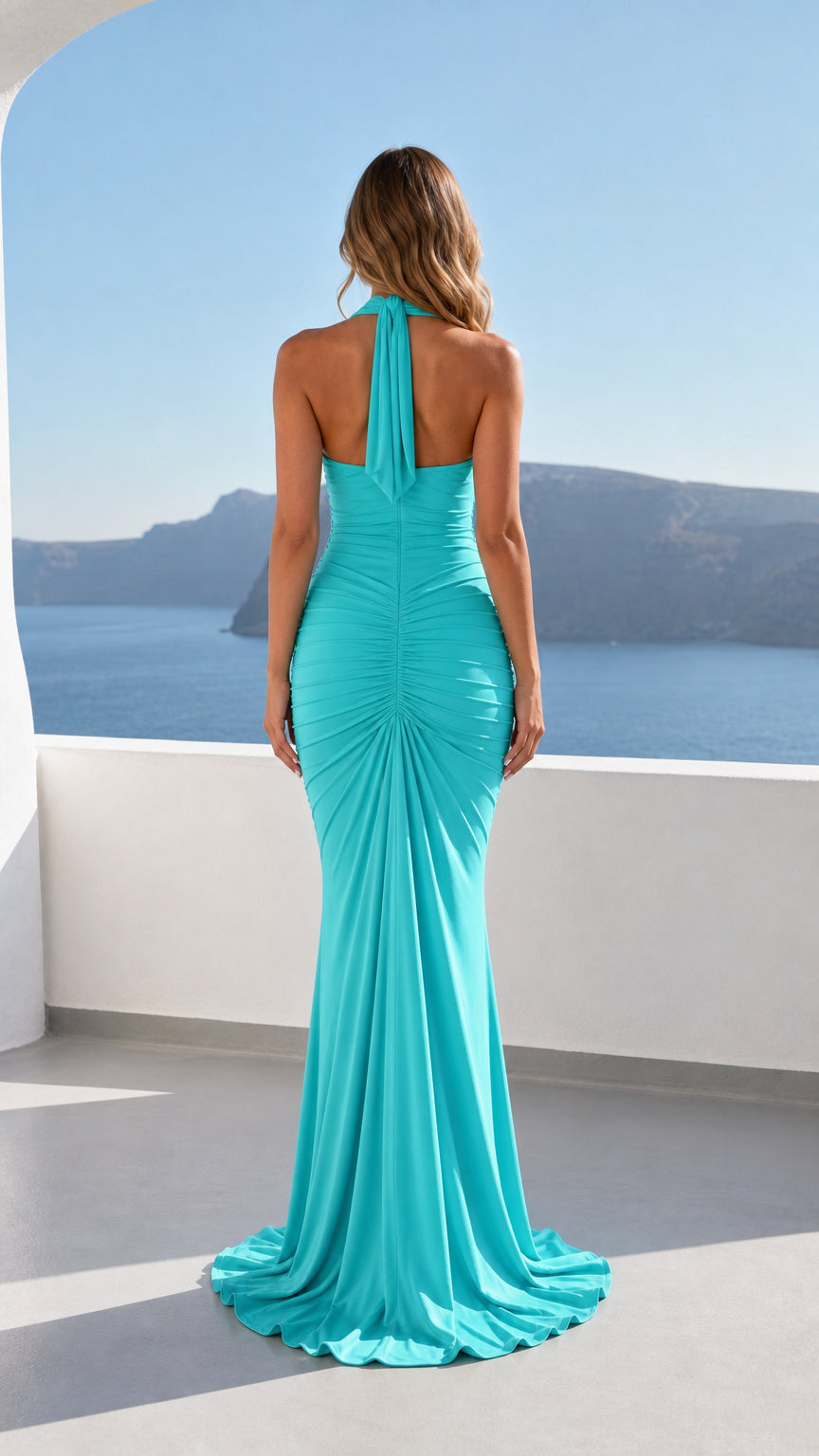 Back view showcasing halter strap details of turquoise dress