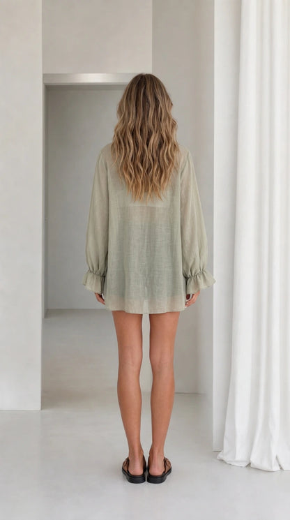 Model wearing sage green kimono cardigan back view