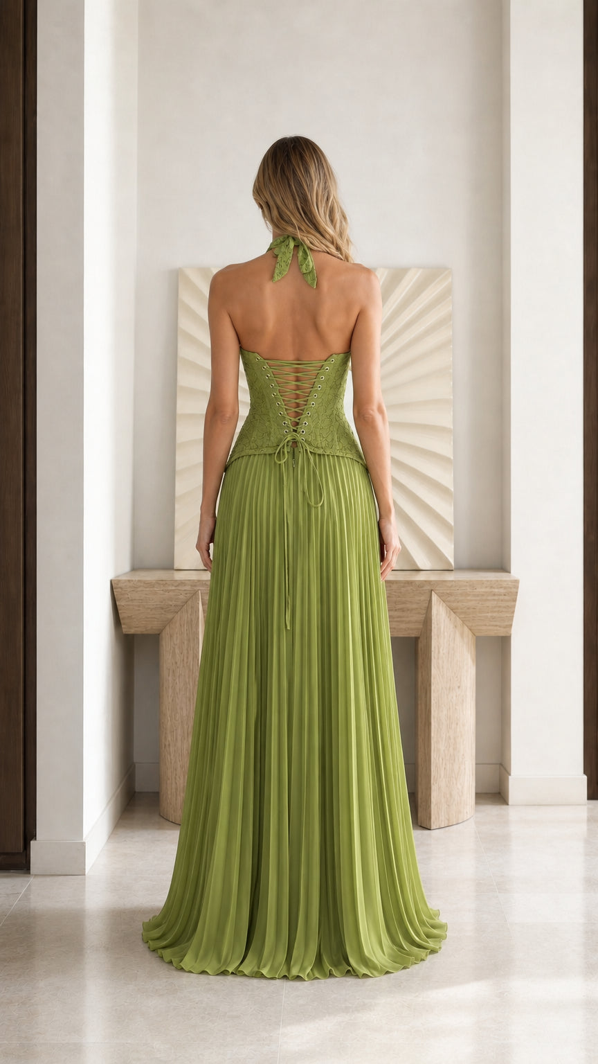 Back view of olive green halter gown showing lace-up corset and open back