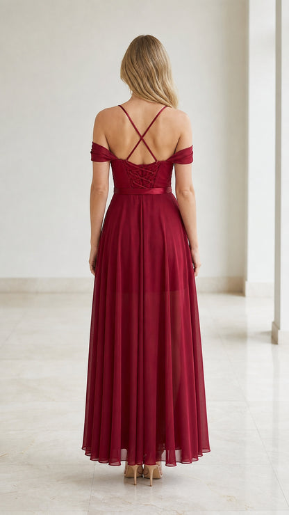 Back view showing lace-up details of burgundy dress