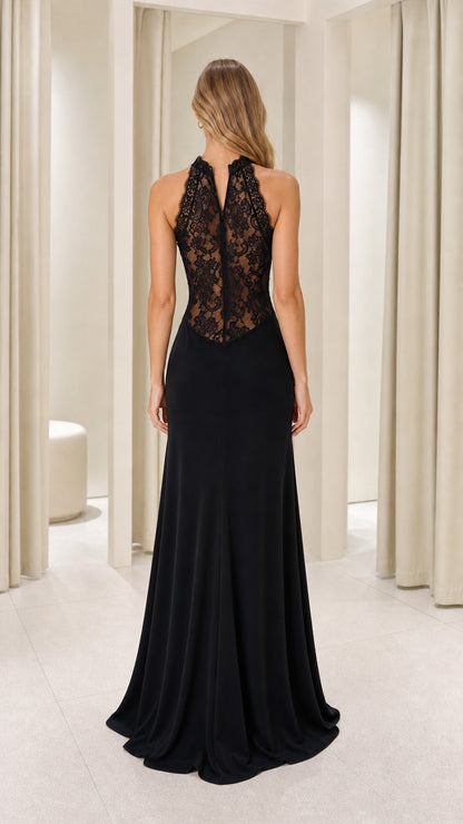 Back view showcasing sheer lace paneling on black gown