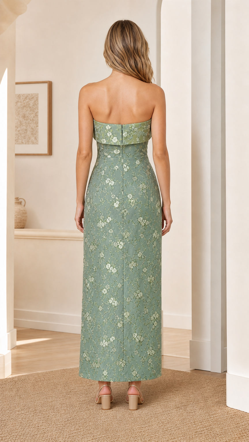 Back view of model showing back of sage strapless maxi dress
