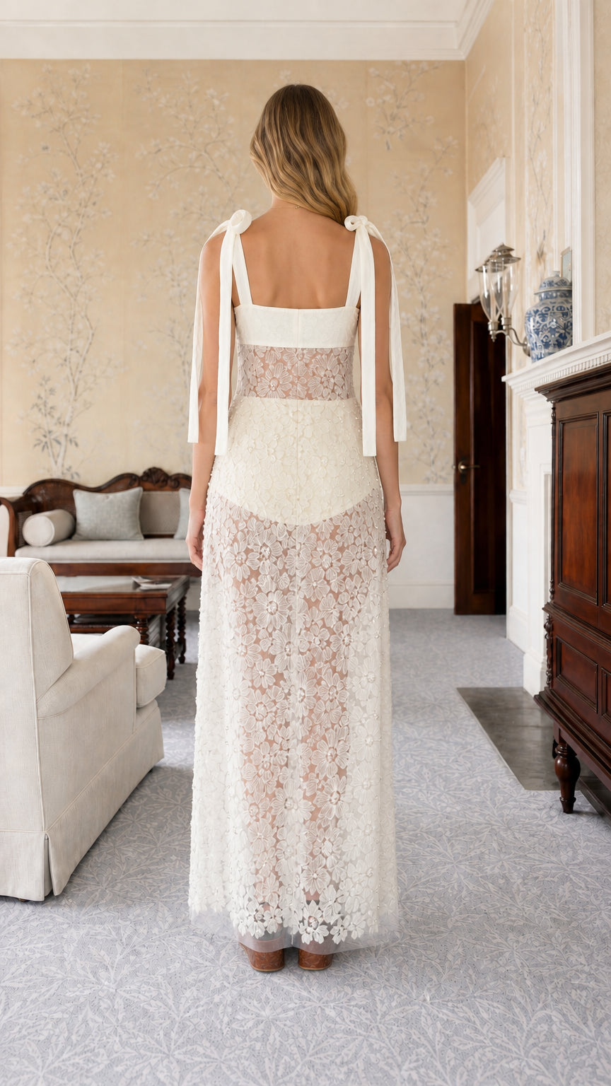 Back view of white tie-strap lace maxi dress