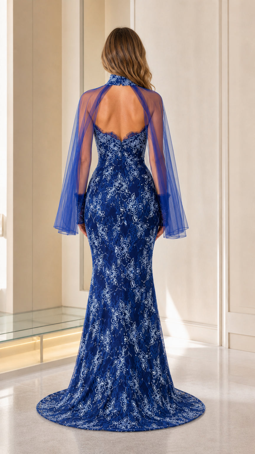 Back view of royal blue lace evening dress showing train
