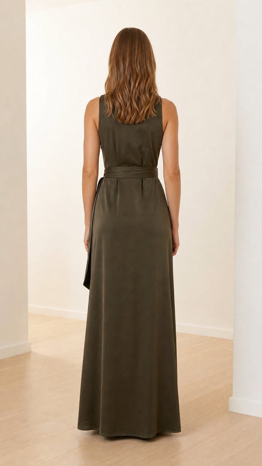 Back view of model in olive green sleeveless maxi dress