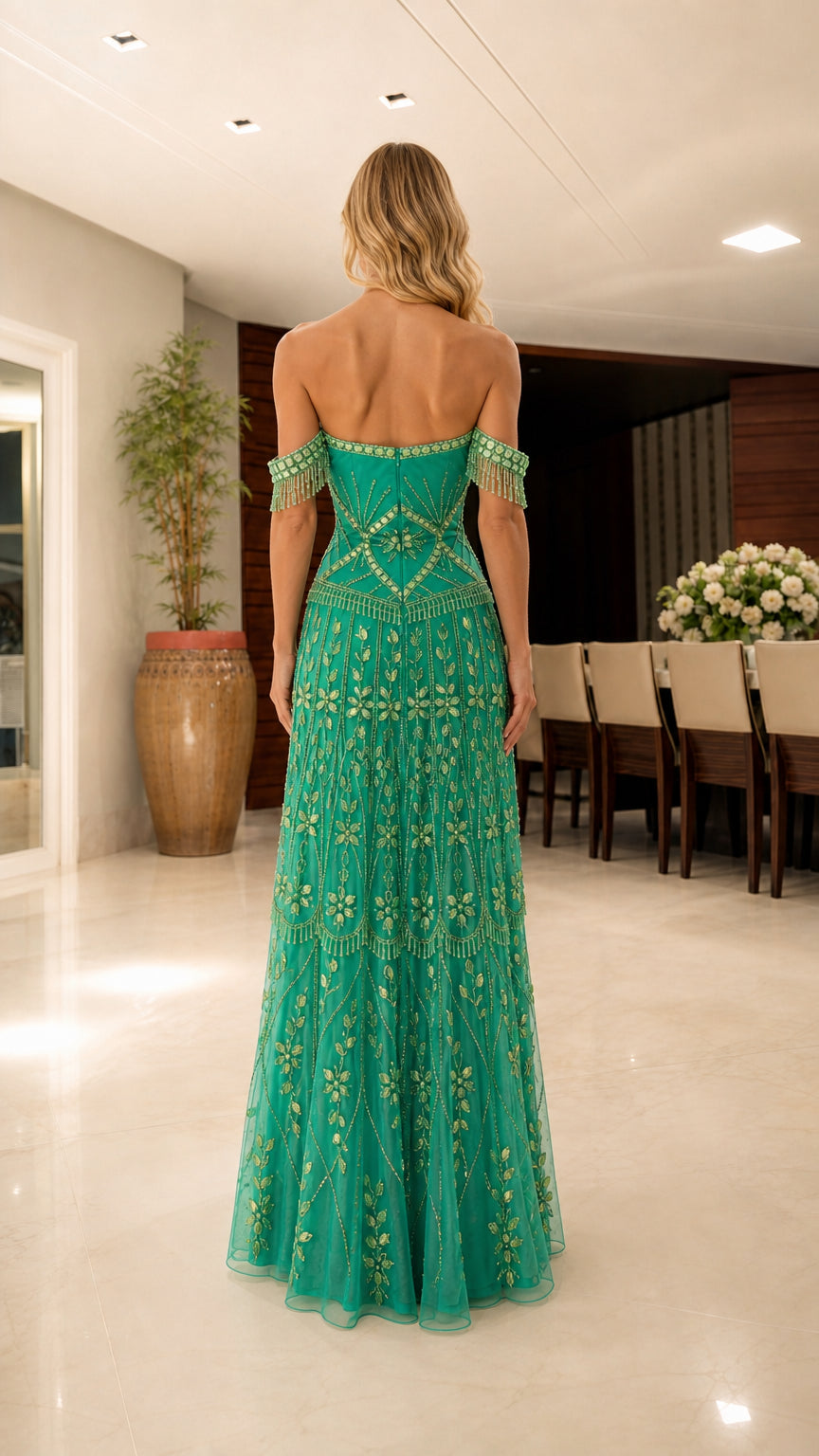 Model wearing Emerald Green formal dress from the back view