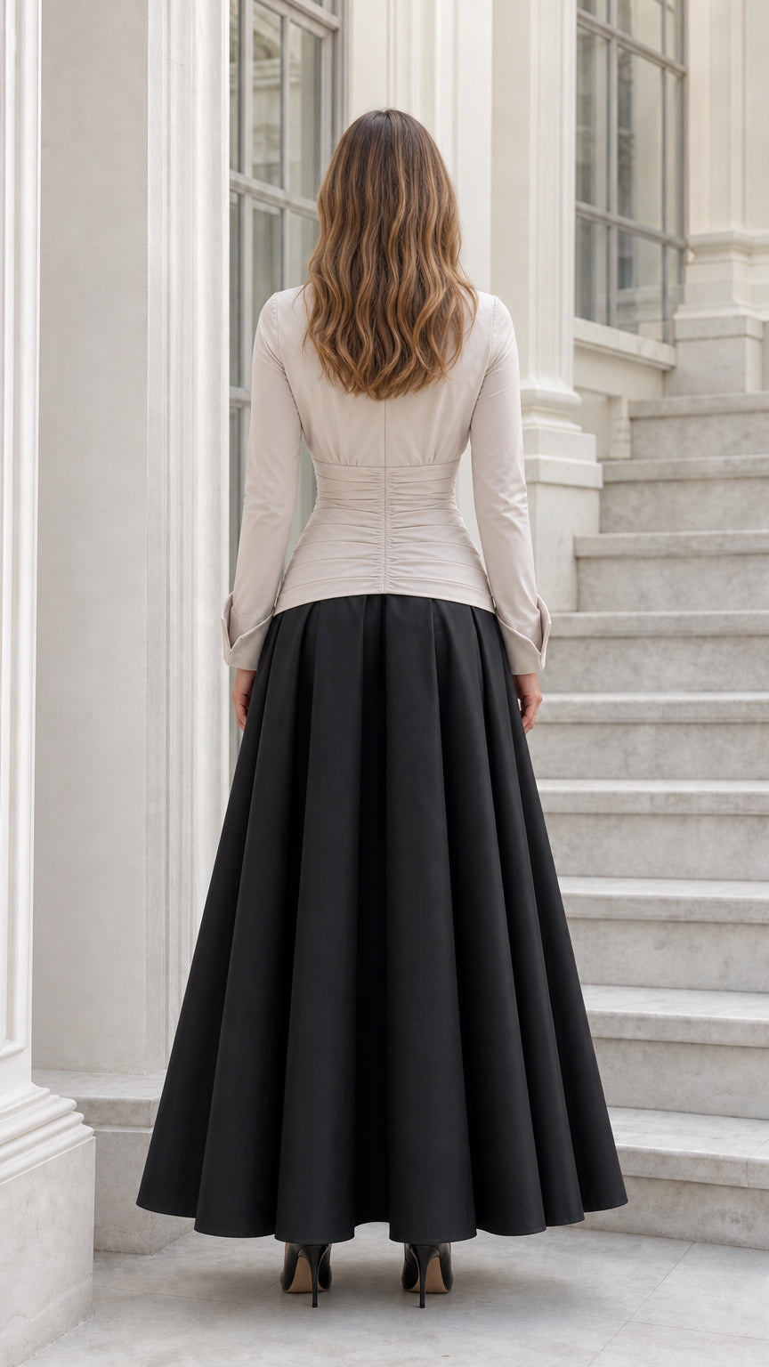 Back view of beige and black two-tone ruched maxi dress