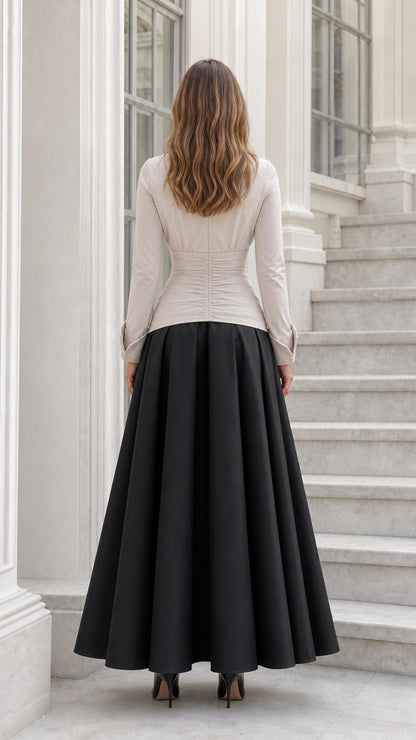 Back view of beige and black two-tone ruched maxi dress