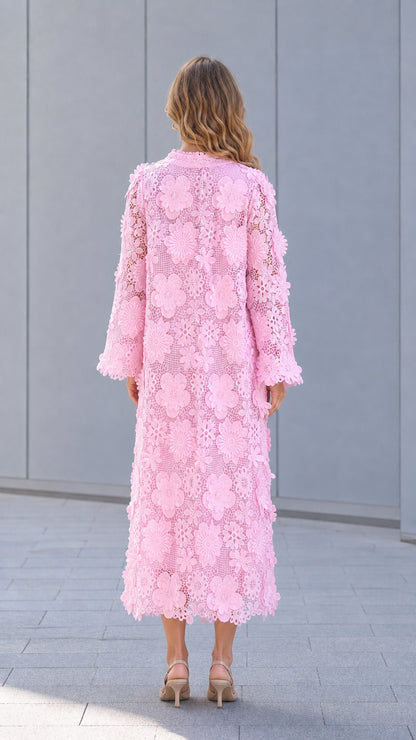 Back view of model in pink lace maxi dress
