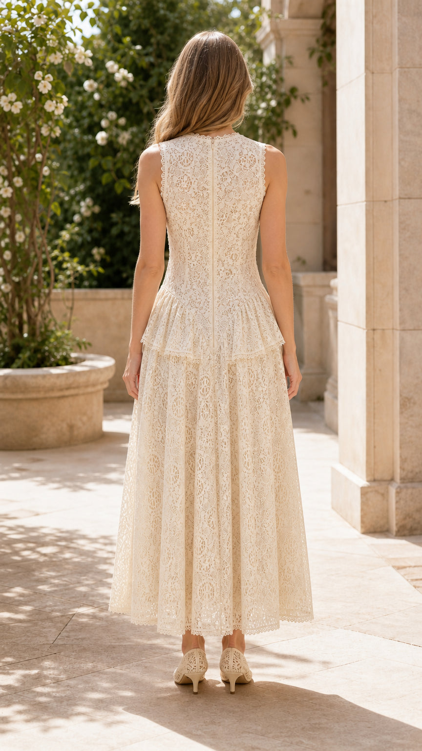 Back view of model wearing cream lace maxi dress