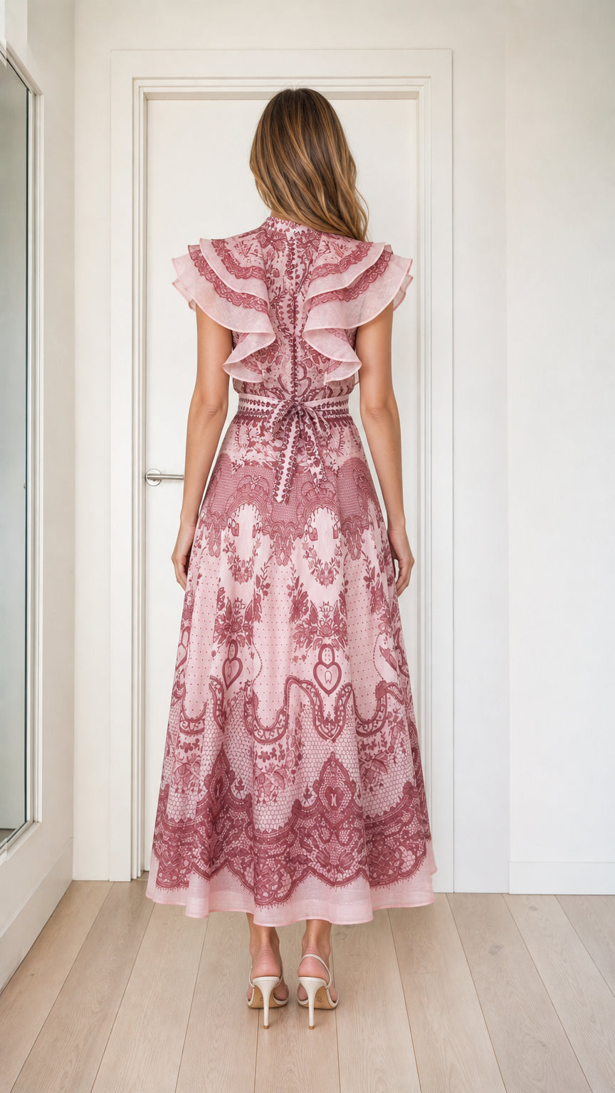 Pink ruffled midi dress back view with tie detail