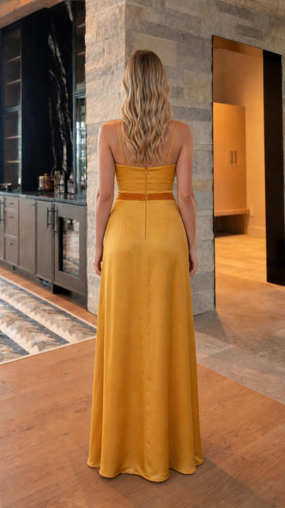 Back view of yellow satin evening gown