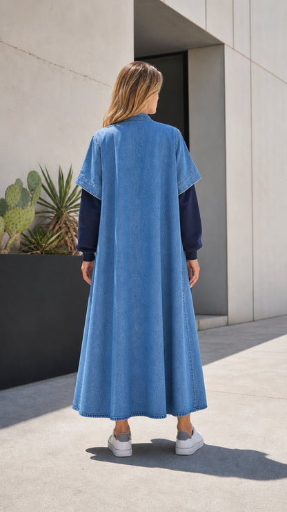 Back view of full-length medium blue denim duster coat