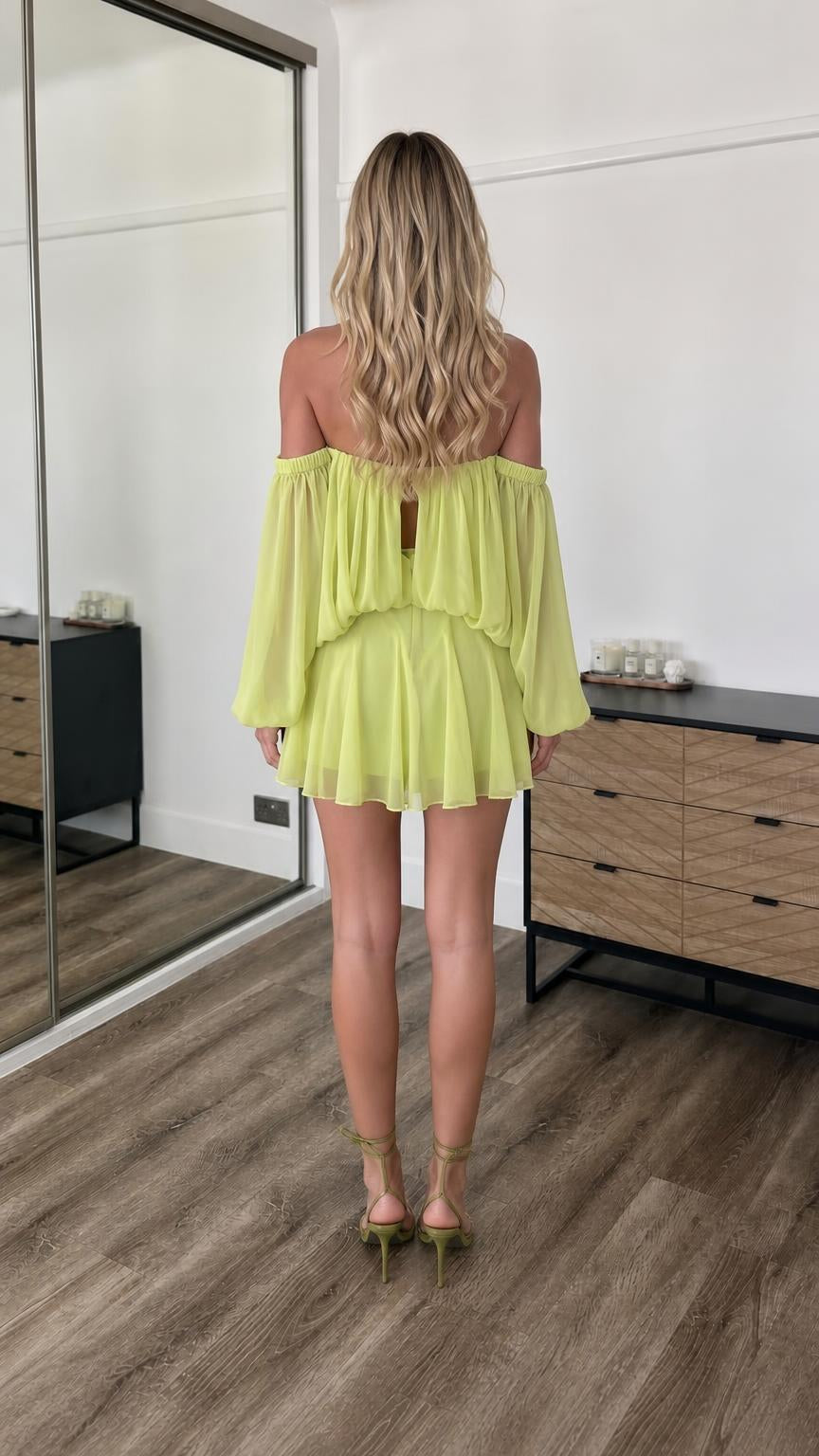 Back view of lime off-the-shoulder mini dress