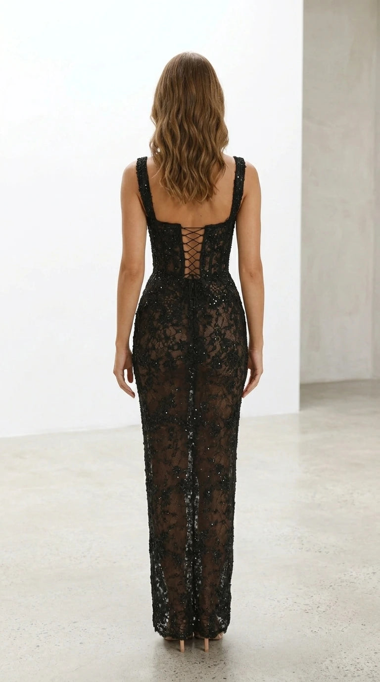 Back view of black lace corset evening dress featuring lace-up detail