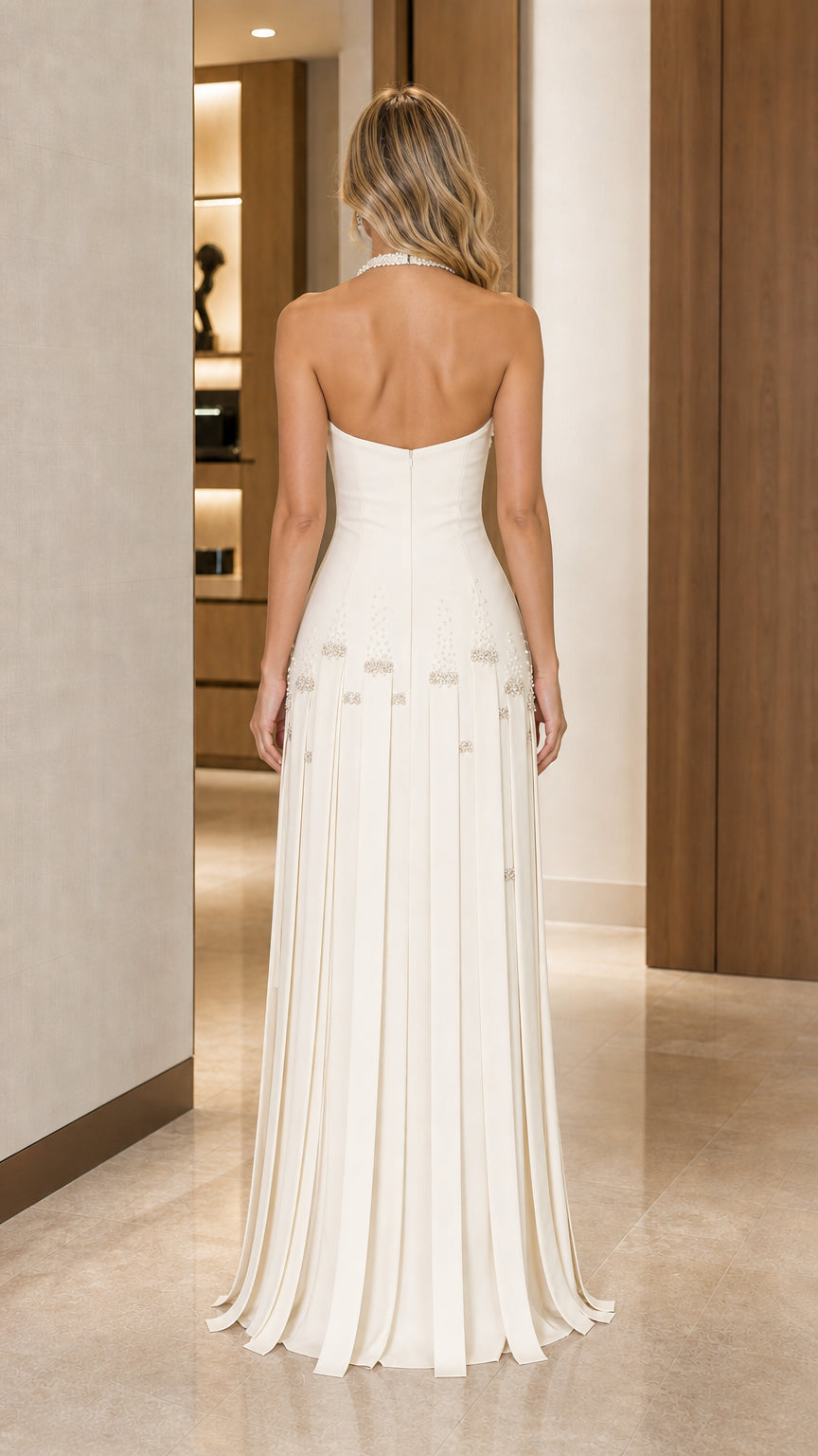 Back view showing the open back and structured bodice