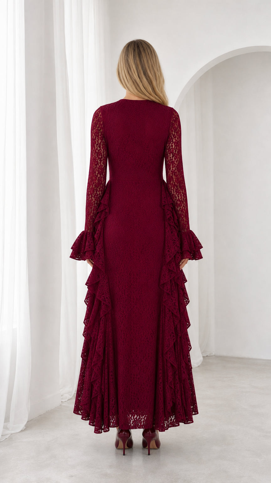 Back view of model in burgundy long sleeve floral lace maxi dress