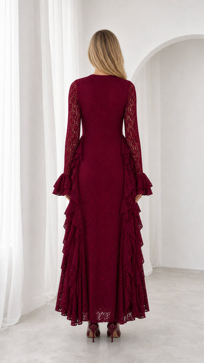 Back view of model in burgundy long sleeve floral lace maxi dress