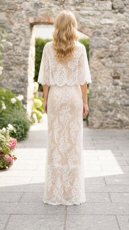 Back view of woman in white lace maxi skirt set
