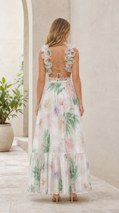 Back view showing lace-up details on white floral dress