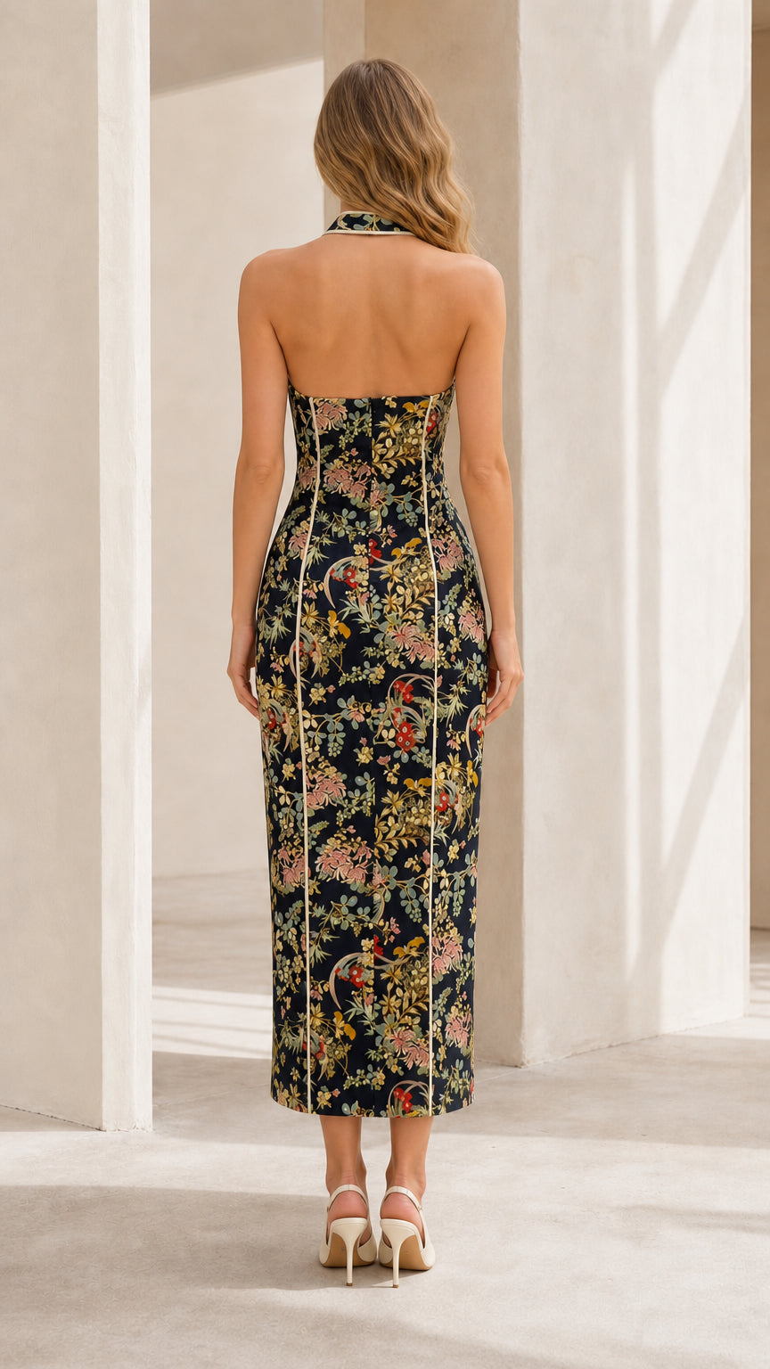 Model wearing navy floral dress back view